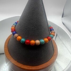 Brand New Chakra Healing Bracelet with Red Tassell Boho Wood Bead